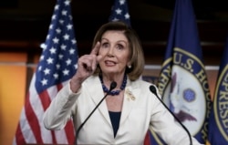 Speaker of the House Nancy Pelosi, D-Calif., meets with reporters at her weekly news conference at the Capitol in Washington, Dec. 5, 2019.