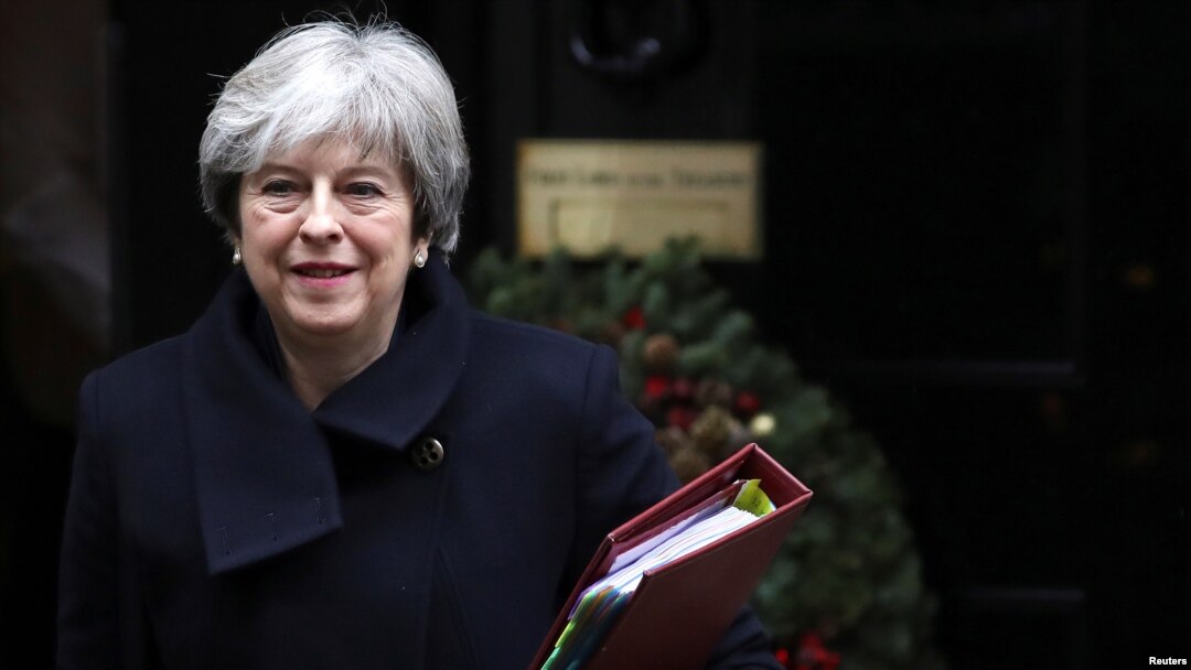 FILE - Britain's Prime Minister Theresa May leaves 10 Downing Street in London, Dec. 13, 2017. 