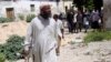 Former Al-Shabab senior official Muktar Robow is show near Mogadishu, June 29, 2010.