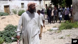 Former Al-Shabab senior official Muktar Robow is show near Mogadishu, June 29, 2010.