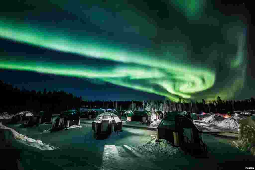 The Aurora Borealis (Northern Lights) is seen in the sky over Arctic Snowhotel in Rovaniemi, Finland, Feb. 28, 2019.