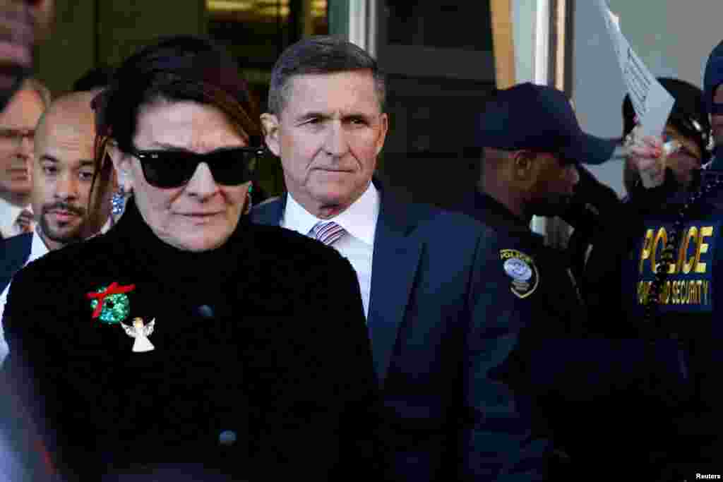 Former U.S. national security adviser Michael Flynn departs the US District Court in Washington after his sentencing was delayed.