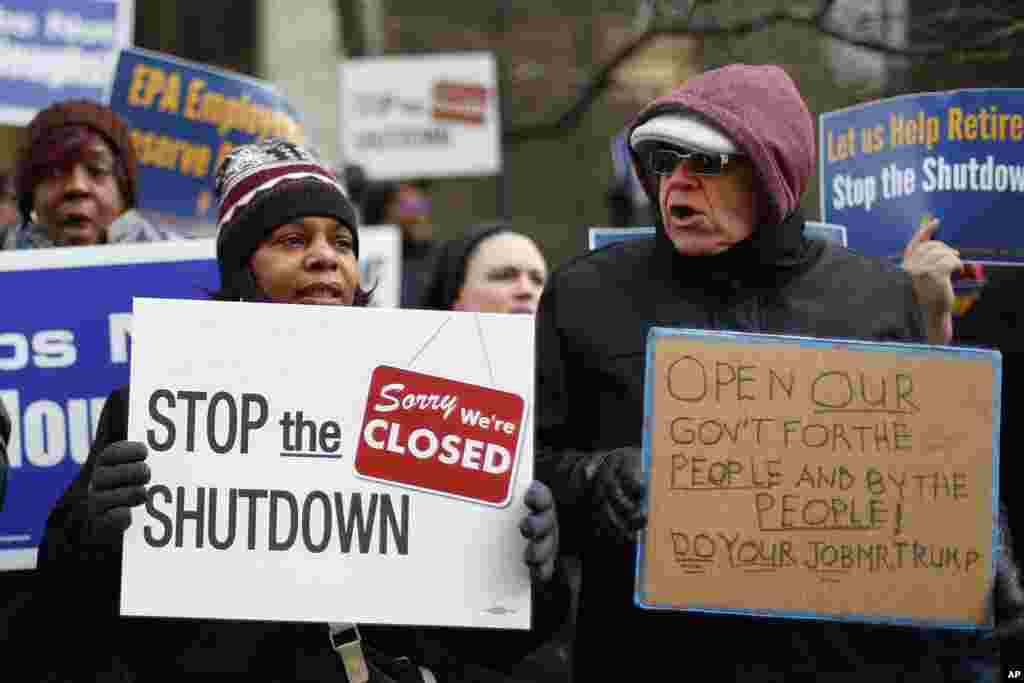 People rally to call for an end to the partial government shutdown in Detroit, Michigan. As the third government shutdown of President Donald Trump's tenure continues, political pressures on Trump and the Democrats have left little room for compromise in the standoff over funding for a border wall and the economic livelihoods of some 800,000 federal workers hang in the balance.