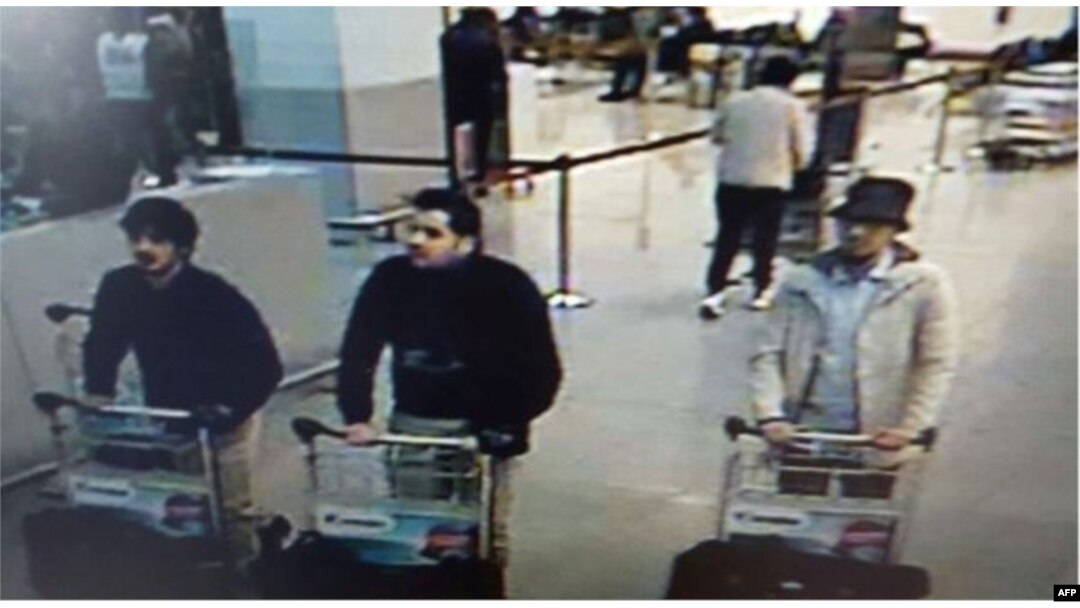 Photo released by Belgian federal police on demand of Federal prosecutor shows screengrab of airport CCTV camera showing suspects of this morning's attacks at Brussels Airport, in Zaventem, March 22, 2016.