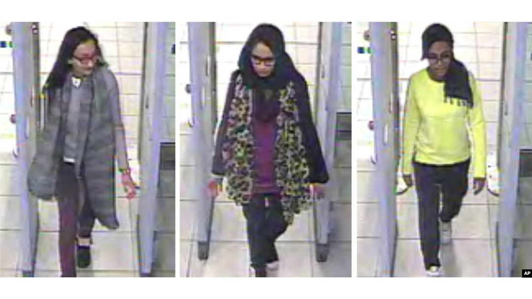 FILE - In this three image combo of stills taken from CCTV issued by the Metropolitan Police in London on Feb. 23, 2015, Kadiza Sultana, 16, left, Shamima Begum,15, center and 15-year-old Amira Abase going through security at Gatwick airport.
