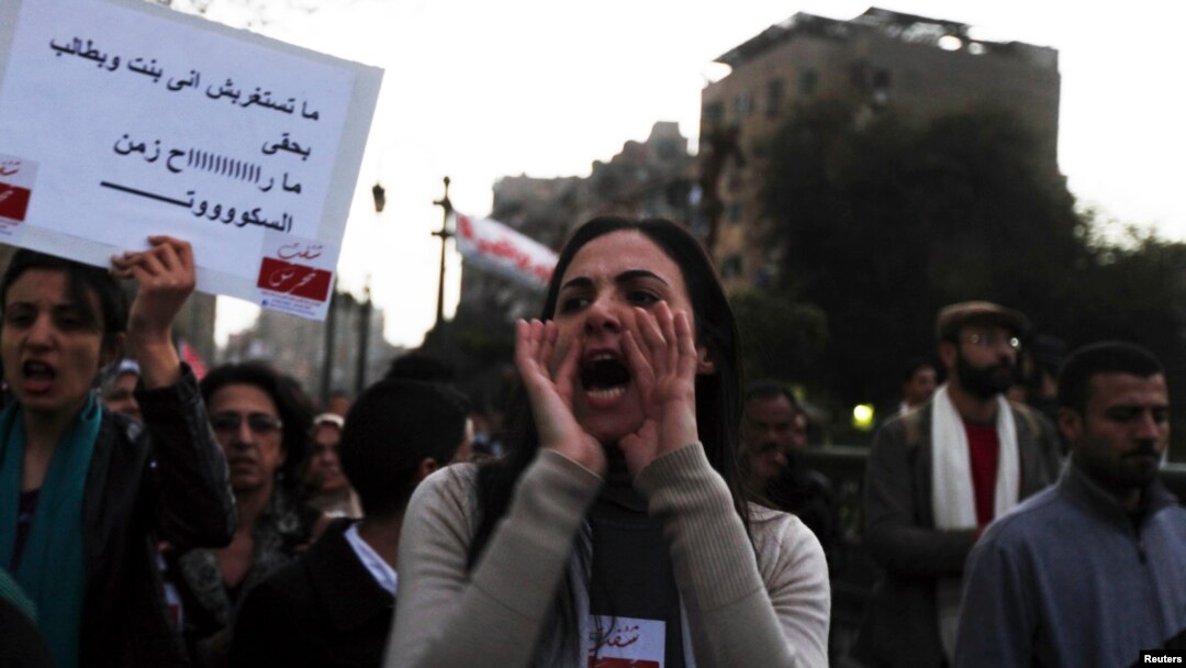A woman shouts slogans against Egyptian President Mohamed Morsi and members of the Brotherhood during a march against sexual harassment and violence against women in Cairo, Feb. 6, 2013.
