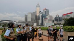 El gobierno de China ha dicho que no tolerará que Hong Kong se convierta en una base para lo que el gobernante Partido Comunista considera una campaña inspirada en el extranjero para socavar su poder sobre la vasta nación de 1.400 millones de habitantes.