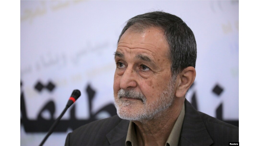 FILE - Riad Darar, co-chairman of the Syrian Democratic Council, is seen during a council meeting in Tabqa, Syria, July 16, 2018.