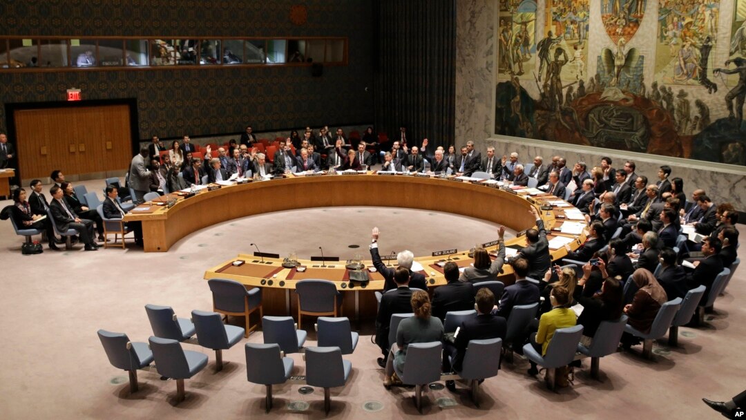 The United Nations Security Council votes on a resolution during a meeting at U.N. headquarters, March 2, 2016.