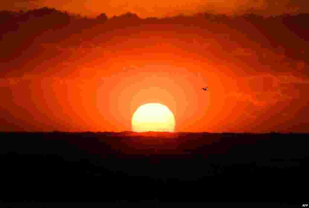 A view shows the sunset on the Mediterranean Sea on Feb. 3, 2019 in Marseille, southern France.