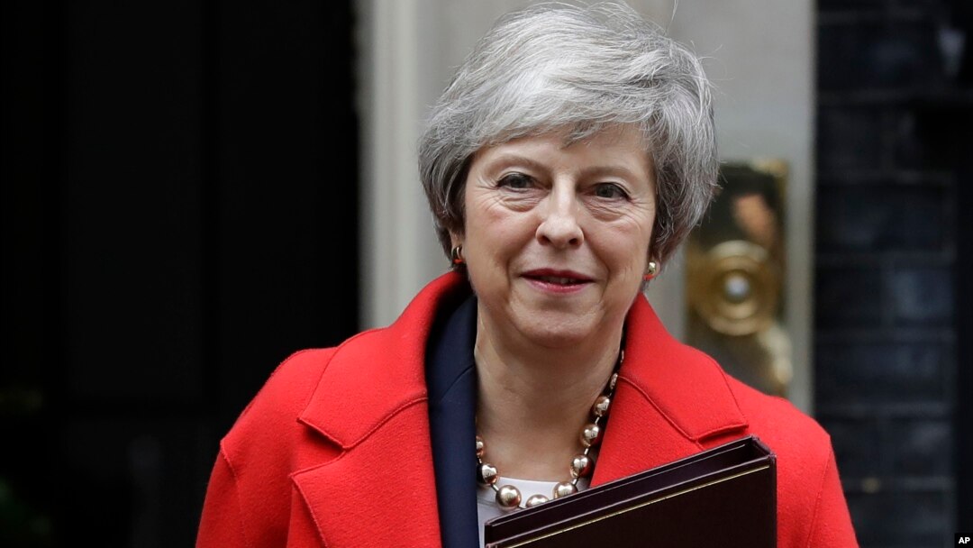 Britain's Prime Minister Theresa May leaves Downing Street in London, Dec. 4, 2018. 