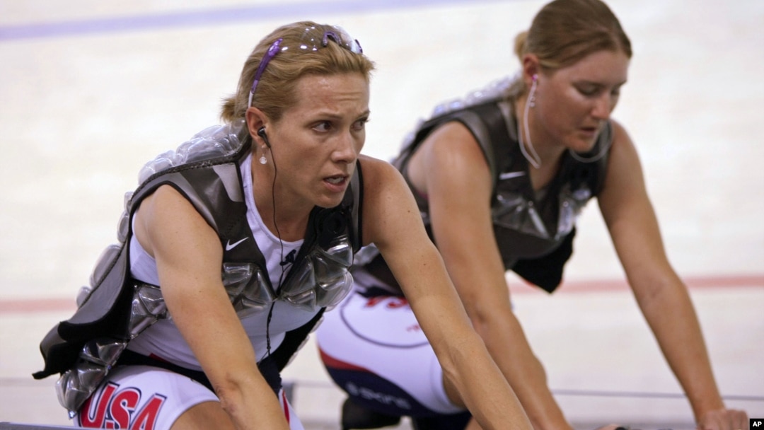 Dotsie Bausch (L) and teammate Lauren Michelle warm up at the World Track Cycling Championships in the Ballerup Arena, Copenhagen, Denmark, March, 24, 2010. 