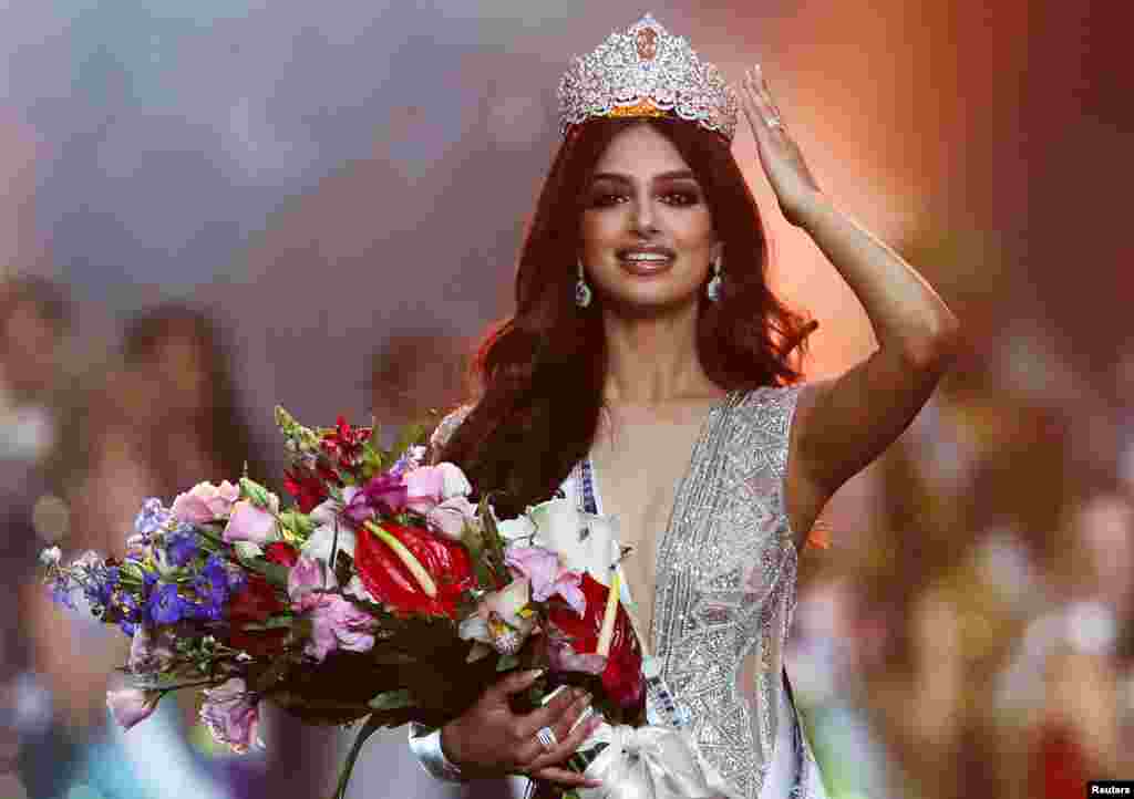 Miss India Harnaaz Sandhu poses after being declared winner of the Miss Universe pageant in the Red Sea resort of Eilat, Israel.