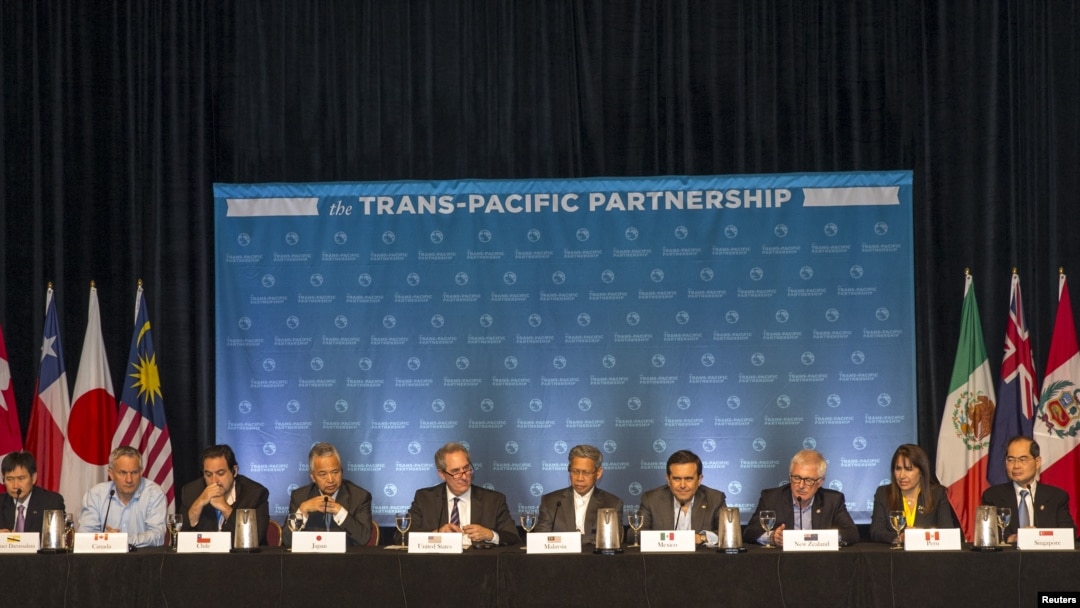 FILE - The 12 Trans-Pacific Partnership (TPP) Ministers hold a press conference to discuss progress in the negotiations in Lahaina, Maui, Hawaii, July 31, 2015. 