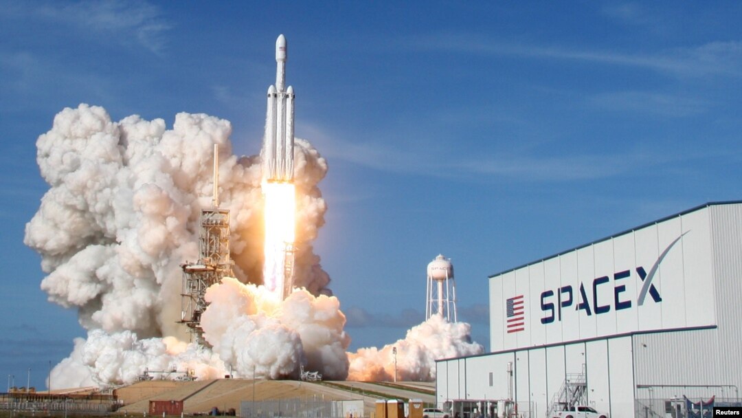 FILE - A SpaceX Falcon Heavy rocket lifts off from historic launch pad 39-A at the Kennedy Space Center in Cape Canaveral, Florida, Feb. 6, 2018. 