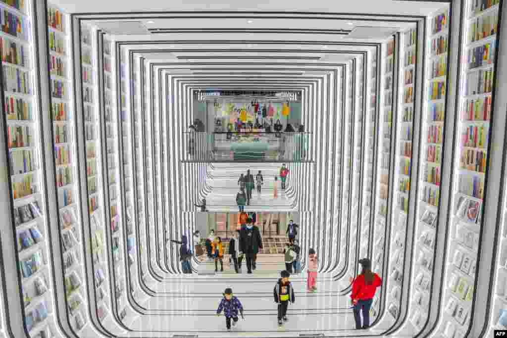 People visit a book store in Foshan in China's southern Guangdong province, Dec. 15, 2021.