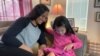 Kunlakan Mamber and her daughter Stella Chalita Mambe, 5, are staying at home amid COVID-19 in Scott AFB, IL. 