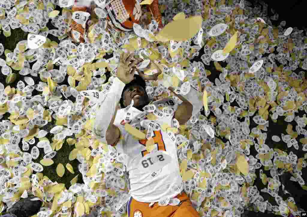 Clemson's Travis Etienne celebrates after the NCAA college football playoff championship game against Alabama, Jan. 7, 2019, in Santa Clara, California.