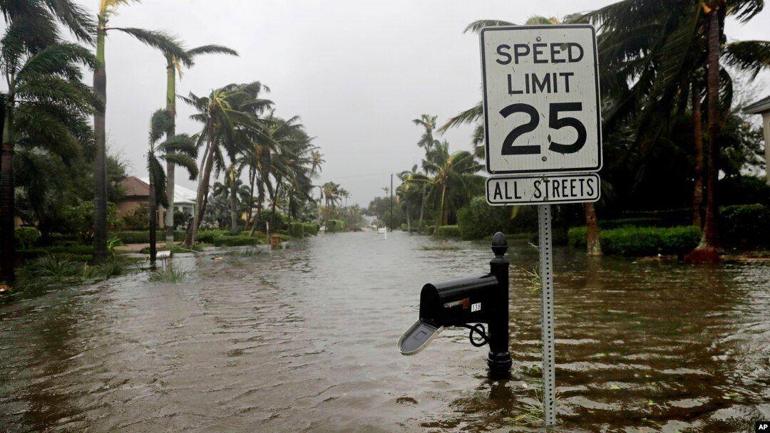 A street is flooded near the ocean after Hurricane Irma passed through Naples, Fla., Sept. 10, 2017. 