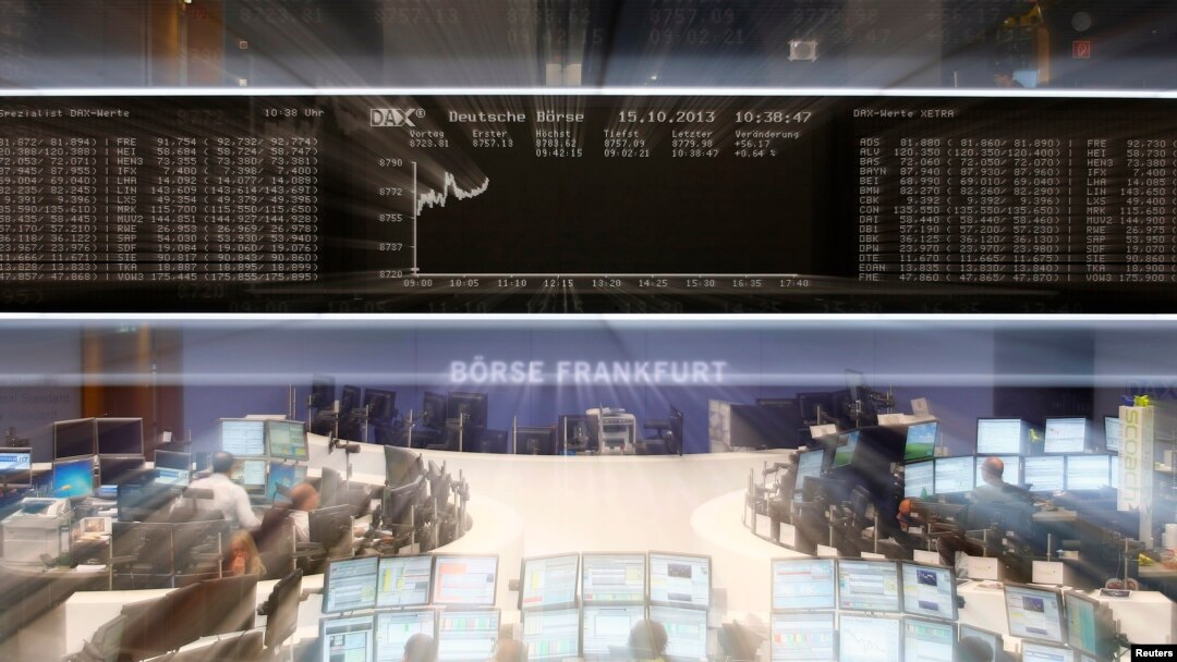 The German share price index DAX board is pictured shortly after the curve reached a new all-time high at the stock exchange in Frankfurt, Oct. 15, 2013. 