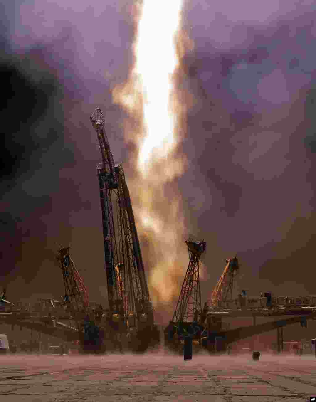 The Soyuz-FG rocket booster with Soyuz TMA-13M space ship carrying a new crew to the International Space Station, ISS, blasts off from the Russian leased Baikonur cosmodrome, Kazakhstan.