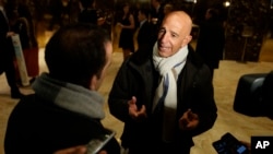 FILE - Tom Barrack, chairman of the inaugural committee, speaks with reporters in the lobby of Trump Tower in New York, Jan. 10, 2017, before meeting with Donald Trump, who then was president-elect.