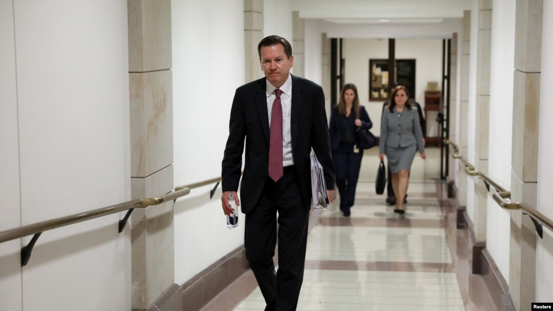 Intelligence Community Inspector General Michael Atkinson departs after testifying at a House Intelligence Committee closed-door hearing on a whistleblower complaint about President Donald Trump's dealings with Ukraine, in Washington, Oct. 4, 2019.