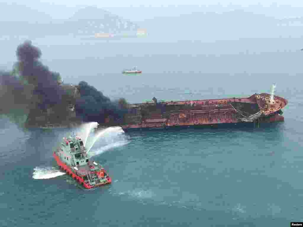 An oil tanker is on fire near Lamma island, Hong Kong, China.