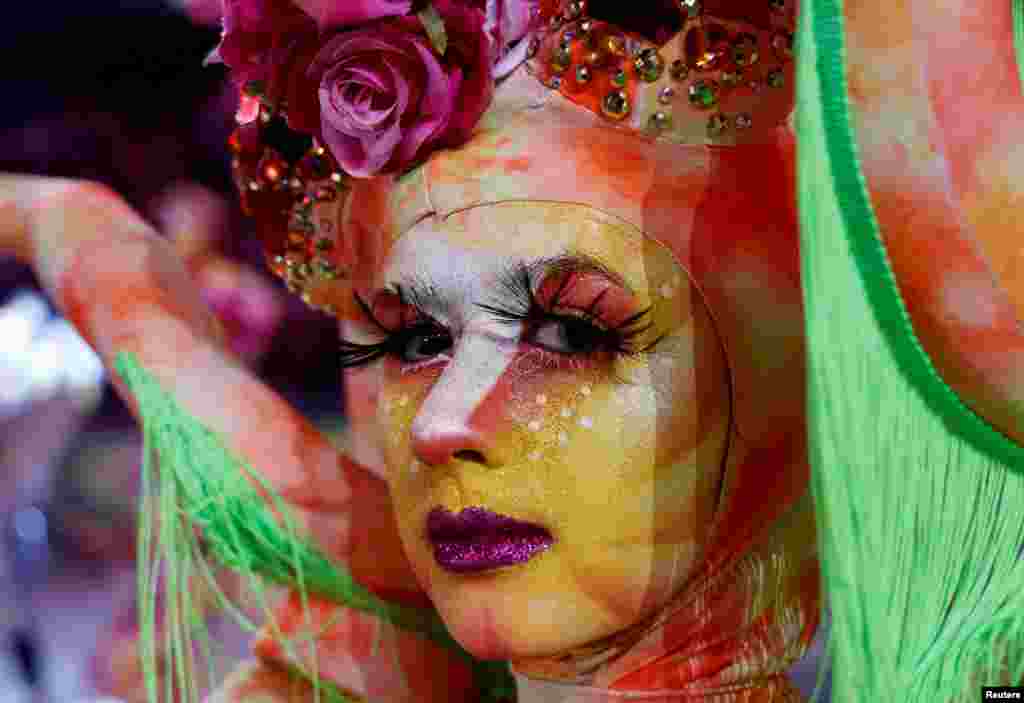 A performer dances during the 137th edition of Nice's Carnival, which theme is "King of Animals", in Nice, France, Feb. 12, 2022. 
