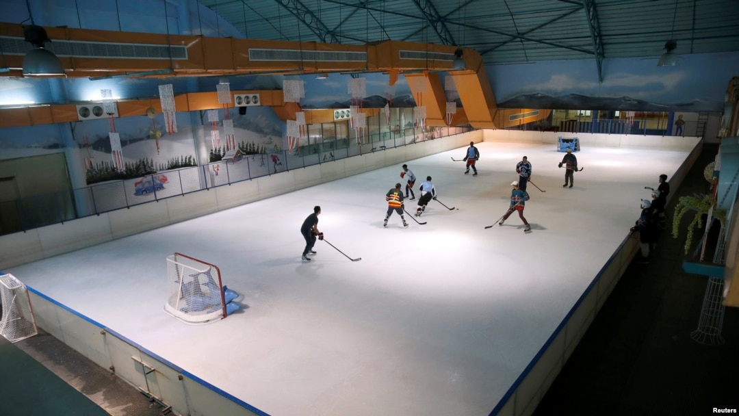FILE - Members of Kenya's ice hockey team skate during a practice session in East Africa's only ice rink, in Nairobi, Kenya, Jan. 24, 2018.