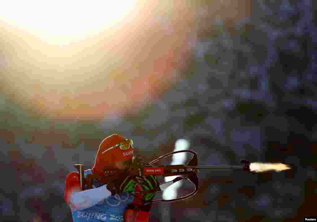 An athlete shoots during training for men's biathlon 4x7.5km relay at the National Biathlon Center in Zhangjiakou, China, at the 2022 Beijing Olympics.