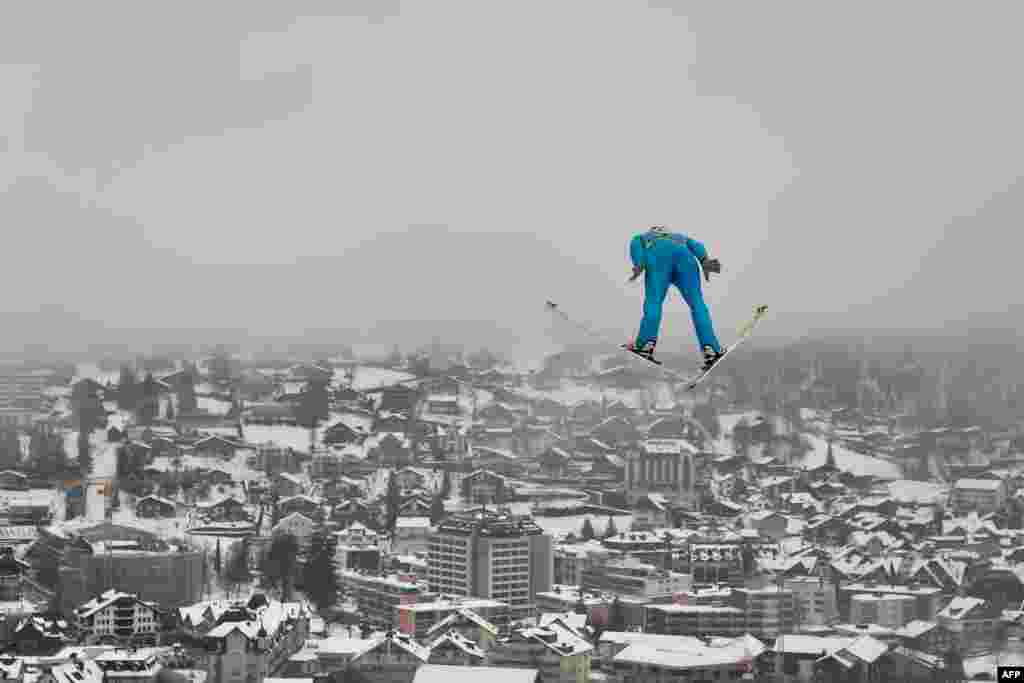 France's Jonathan Learoyd soars through the air during the men's FIS Ski Jumping World Cup competition in Engelberg, central Switzerland.