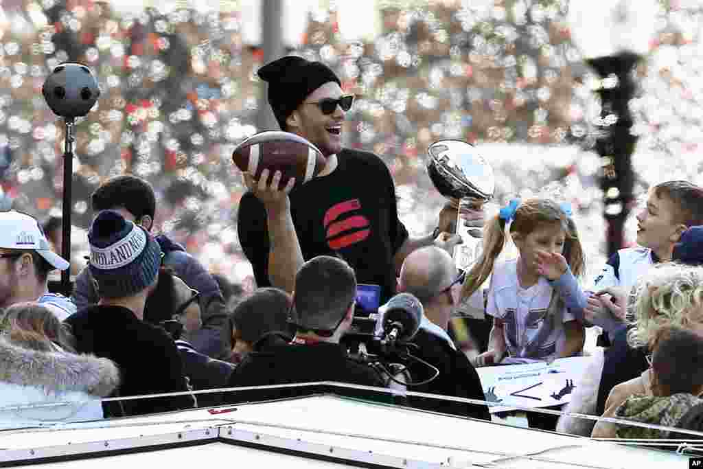 New England Patriots quarterback Tom Brady rides a duck boat during the Patriots parade through downtown Boston, Massachusetts, to celebrate their win over the Los Angeles Rams in Sunday's NFL Super Bowl 53 football game in Atlanta.