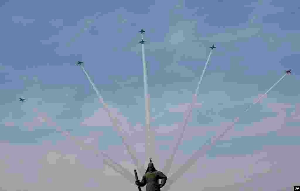 South Korea's Black Eagles aerobatic flight team performs during a rehearsal for the upcoming government ceremony to mark the centennial of the March First Independence Movement Day against Japanese colonial rule (1910-45), in Seoul, South Korea.