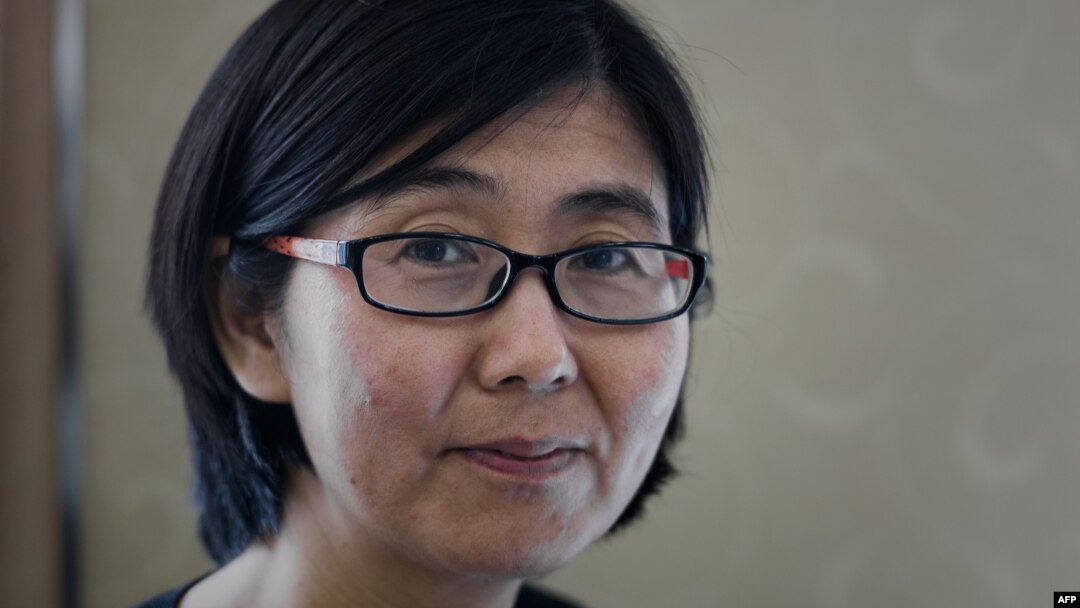 Wang Yu, the lawyer of late Chinese human rights activist Cao Shunli, poses during an interview in Hong Kong, March 20, 2014. 