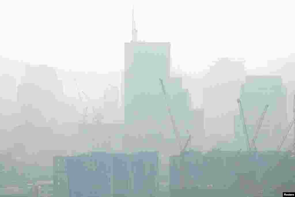 The skyline is seen through polluted air during a poor air quality day in Bangkok, Thailand.