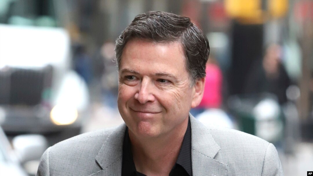 Former FBI director James Comey arrives for an appearance on "The Late Show with Stephen Colbert" at the Ed Sullivan Theater, April 17, 2018, in New York. 