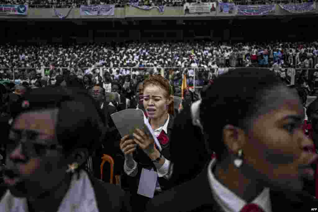 A Catholic choir sings during the inauguration of the new Archbishop of Kinshasa, Fridolin Ambongo in Kinshasa, Democratic Republic of Congo.