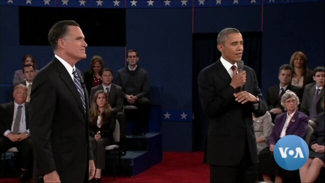 Moderators Hold the Center of Presidential Debate Stage 