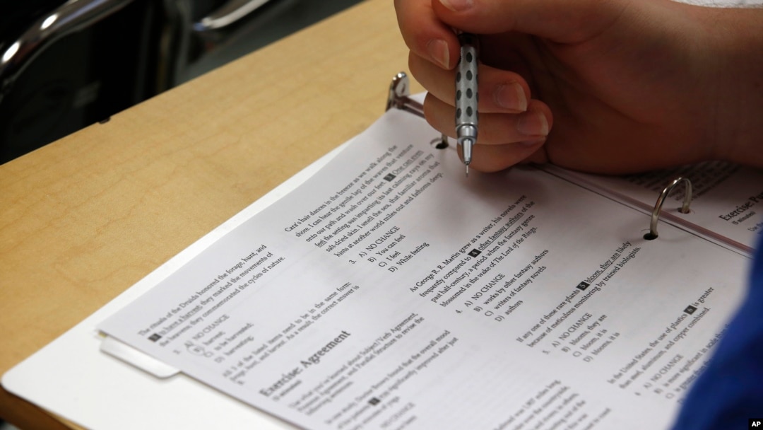 FILE - A student takes the SAT, a standardized test widely used for college admissions in the United States.
