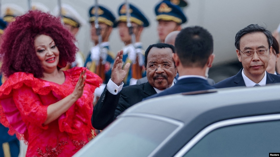 FILE - Cameroonian President Paul Biya, center, waves as he arrives at the Beijing Capital International Airport ahead of the 2024 Summit of the Forum on China-Africa Cooperation in Beijing on Sept. 4 2024. The summit was the last time Biya has been seen in public.