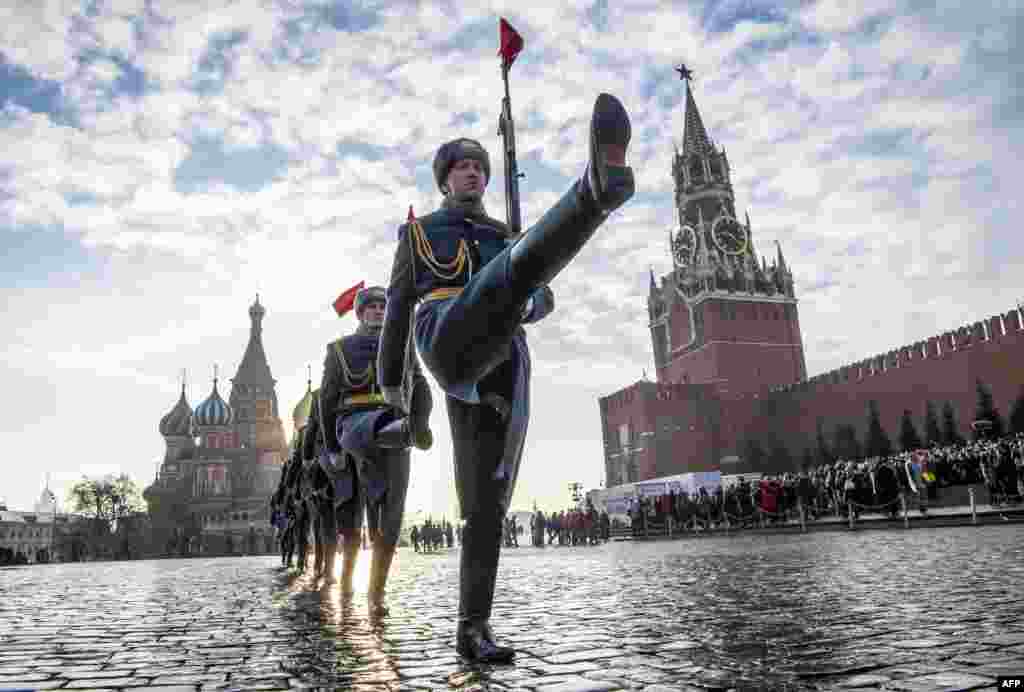 Russian honor guards march during the military parade at Red Square in Moscow.