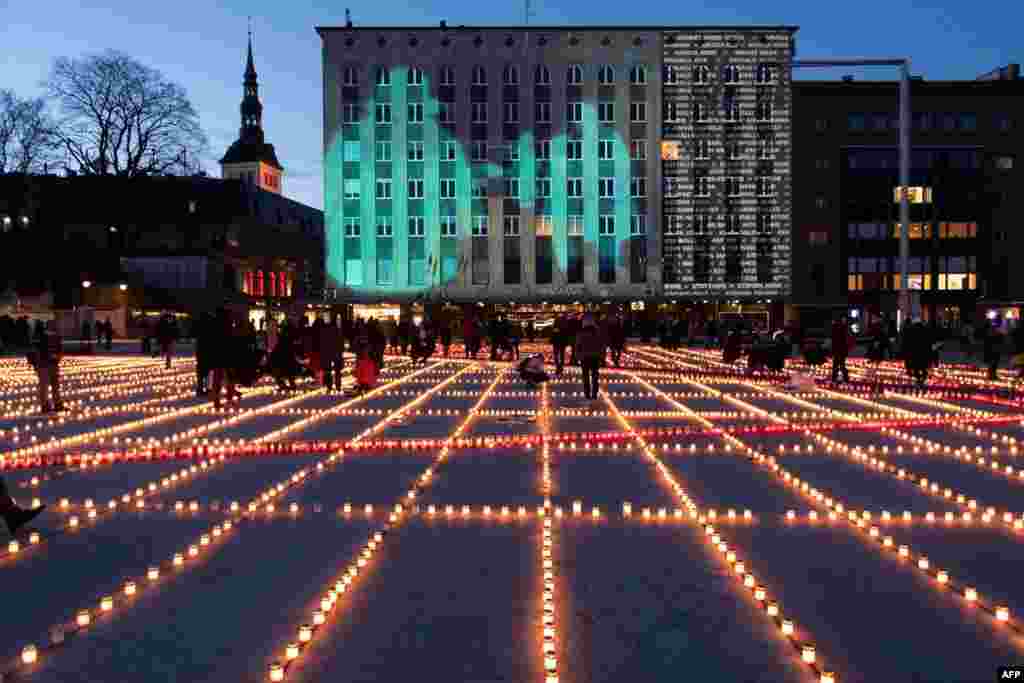 Thousands of candles are lit in Tallinn, Estonia to commemorate the tens of thousands of victims of the deportation march when, from March 25-28, 1949, more than 22,000 people in Estonia alone were forced from their homes and deported east, many to never return.