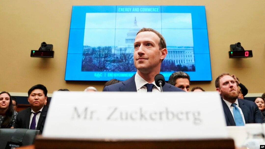 Facebook CEO Mark Zuckerberg arrives to testify before a House Energy and Commerce hearing on Capitol Hill in Washington, Wednesday, April 11, 2018, about the use of Facebook data to target American voters in the 2016 election and data privacy.