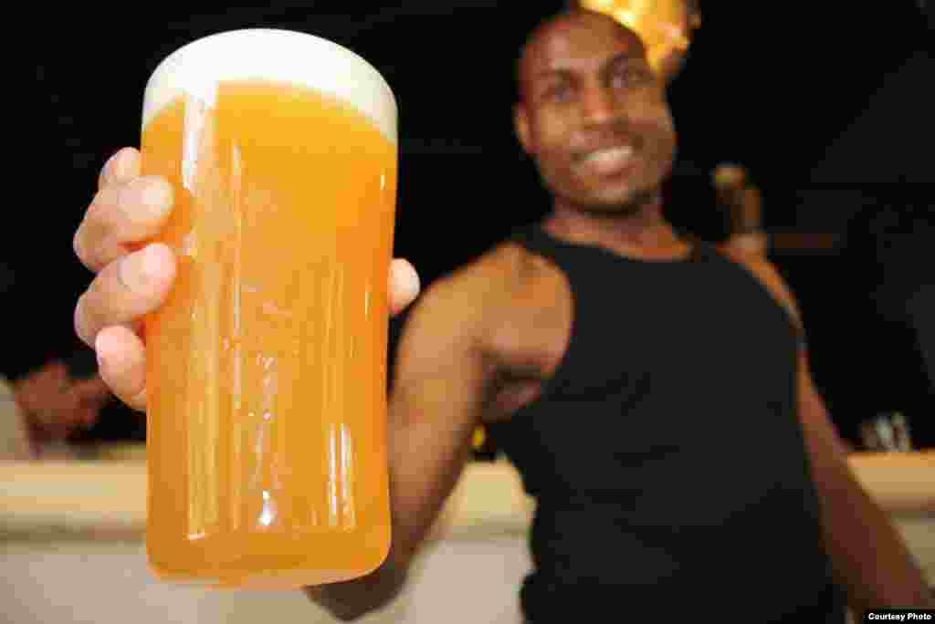 Demand is swelling for tastier and more expensive specialty beers, says Johannesburg barman ‘Chicken’ Talkmore Mlotshwa. (Photo Credit: Darren Taylor)