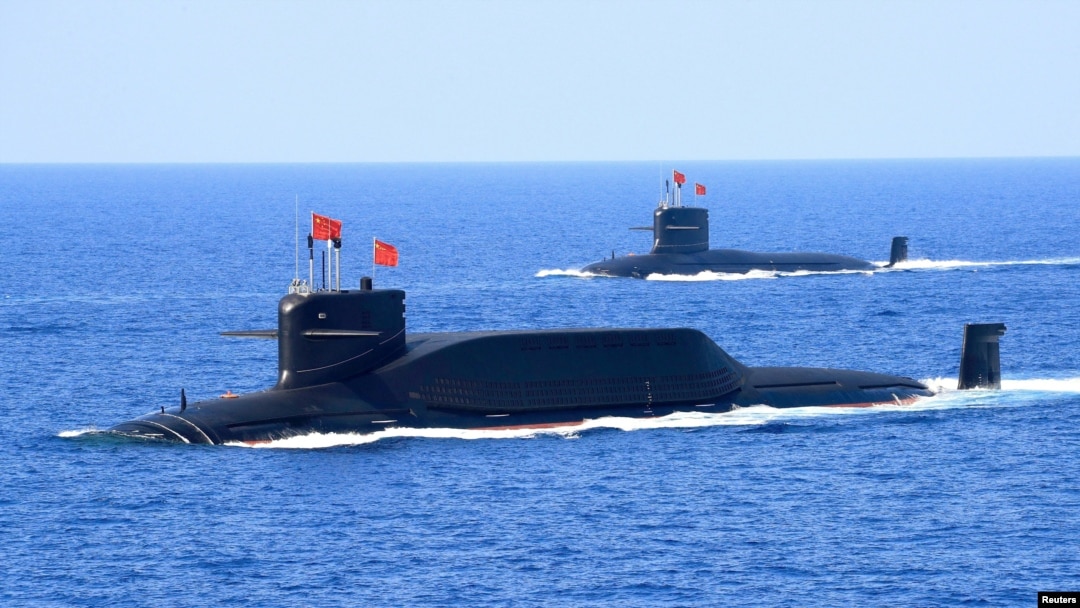 FILE - A nuclear-powered Type 094A Jin-class ballistic missile submarine of the Chinese People's Liberation Army's navy is seen during a military display in the South China Sea, April 12, 2018.