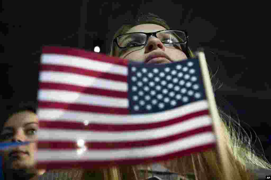 An audience member listens as Democratic presidential candidate Sen. Bernie Sanders, I-Vt., speaks during a campaign stop at the University of New Hampshire Whittemore Center Arena, Feb. 8, 2016, in Durham, N.H.