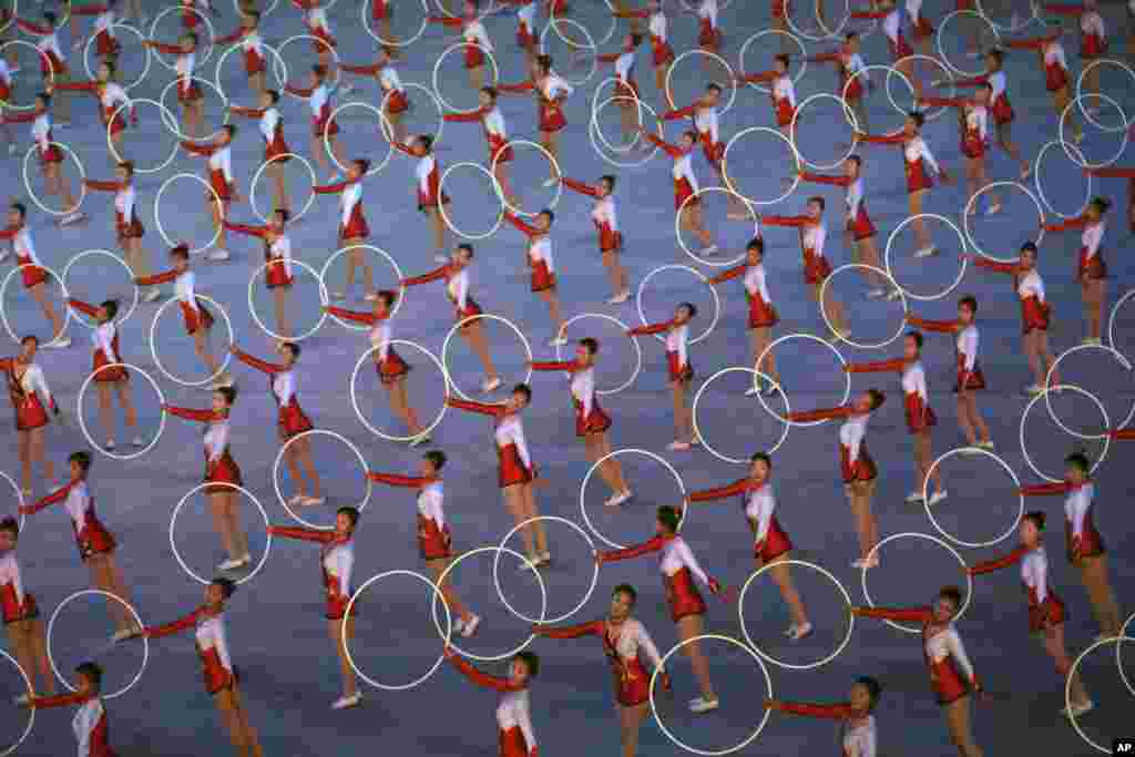 Dancers perform during "The Glorious Country" mass games at May Day Stadium in Pyongyang, North Korea.