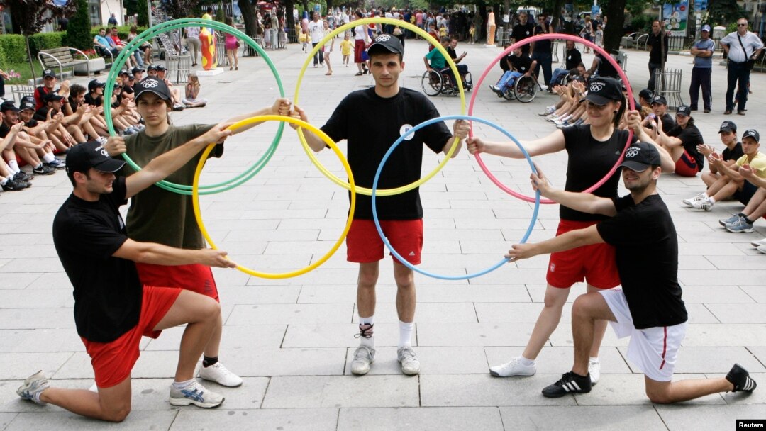 FILE - Participants perform during an event organized by Kosovo's National Olympic Committee in the capital Pristina.