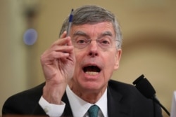Top U.S. diplomat in Ukraine William Taylor testifies before the House Intelligence Committee on Capitol Hill in Washington, Wednesday, Nov. 13, 2019, during the first public impeachment hearing of President Donald Trump's efforts to tie U.S. aid…